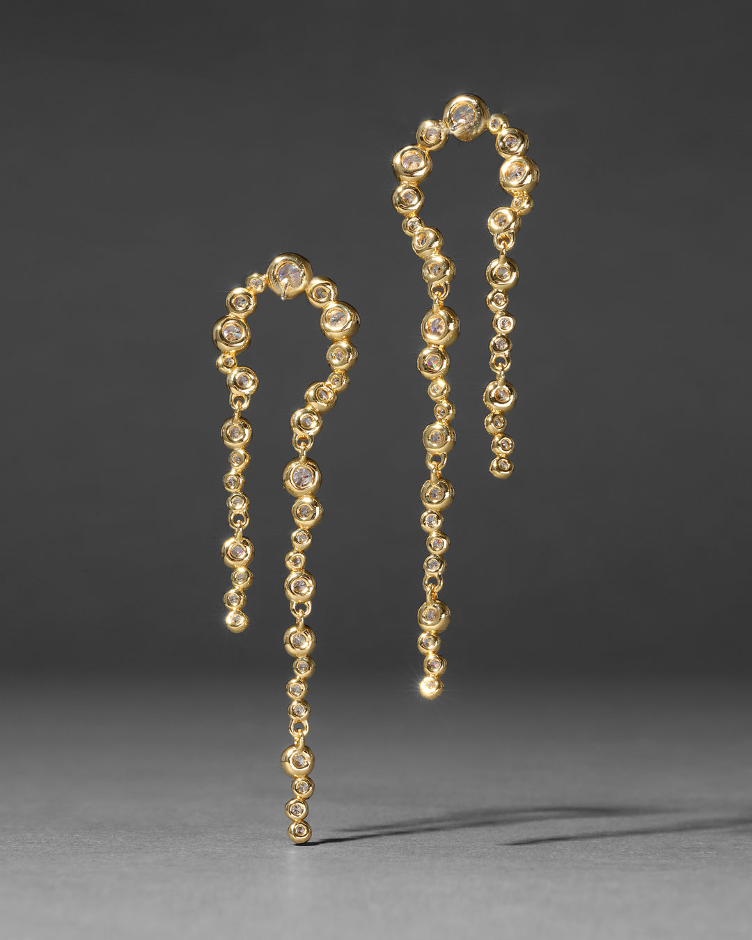 Asterales Gold Arched Long Earring