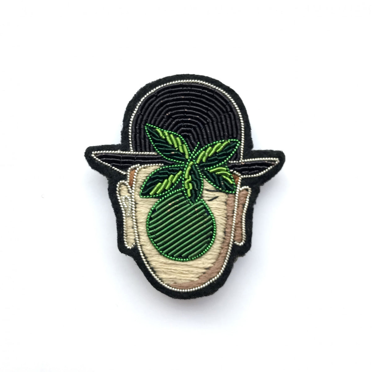 Magritte Face Brooch